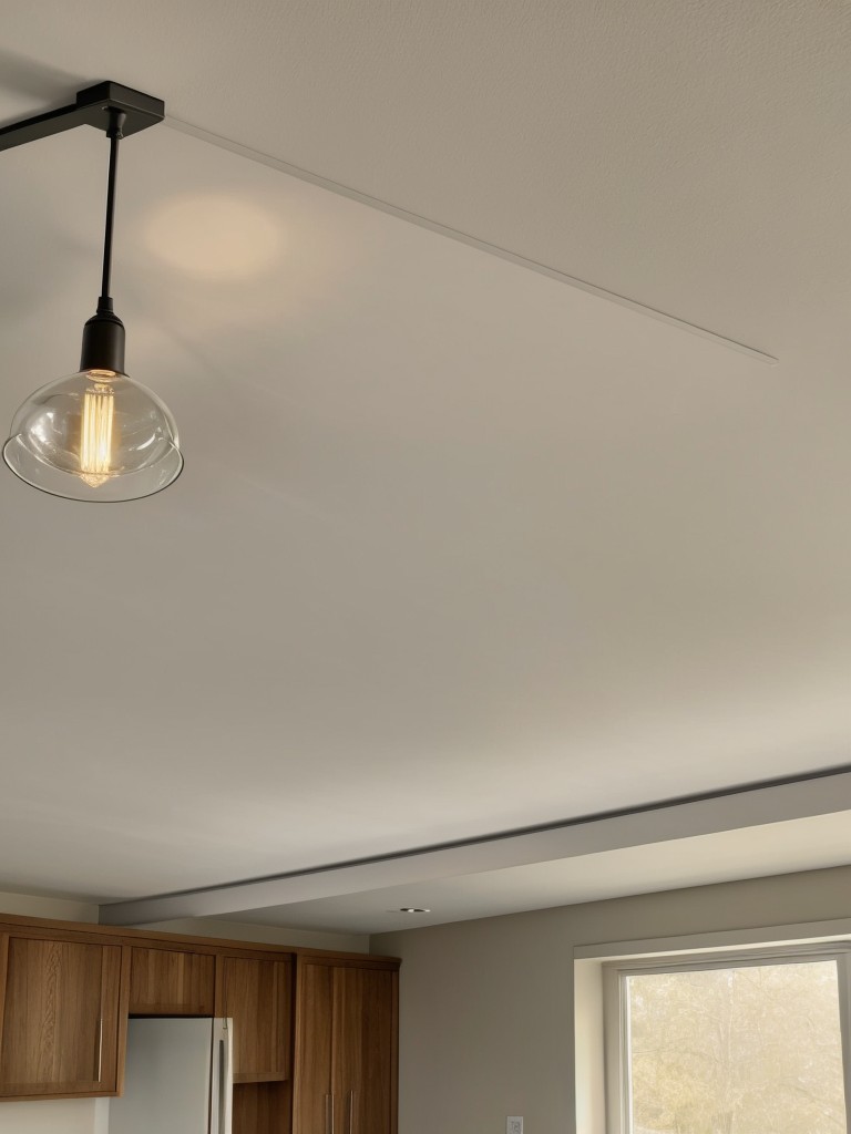 Install overhead or recessed lighting to minimize the use of floor and table lamps, freeing up valuable surface space.